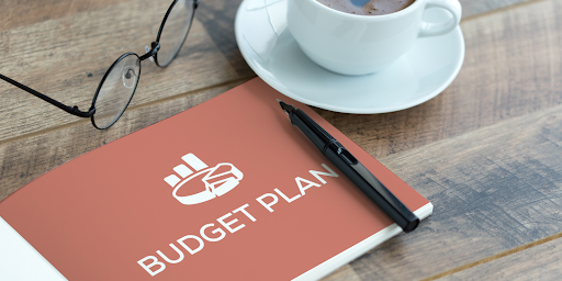 budget planning book on table budget planning book on table
